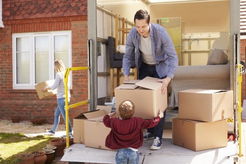 Team of removal company professionals preparing for a move