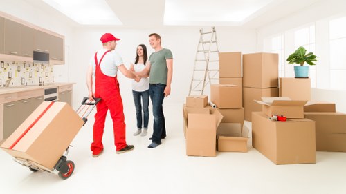Professional movers handling a household move in Brixton