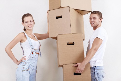 Professional movers from QuickMove Services assisting customers