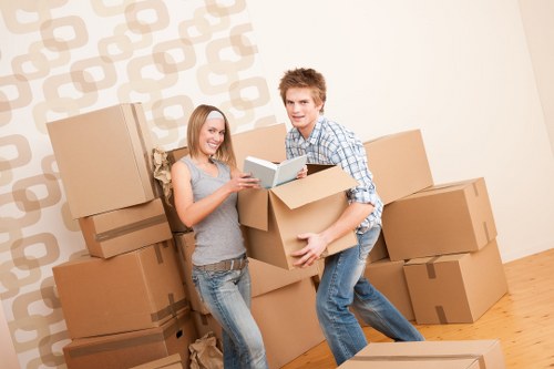 Professional packers organizing items for moving